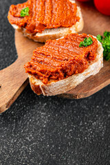 Pepper pate red pepper vegetarian dip roasted vegetable hummus appetizer vegetables dish fresh gourmet food background on table rustic food top view copy space keto and paleo diet vegan food
