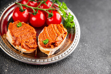 Pepper pate red pepper vegetarian dip roasted vegetable hummus appetizer vegetables dish fresh gourmet food background on table rustic food top view copy space keto and paleo diet vegan food