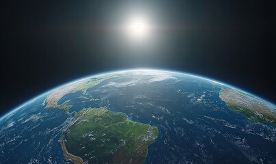 Fototapeta premium Sun rising over Earth, showing North and South America, clouds, and oceans.