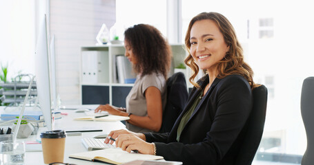 Portrait, business and woman with smile in office for corporate career, consultant and accounting job. Happy, female person and pride with computer for finance management, investment and opportunity