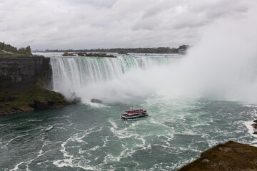 Niagara falls with cruise ship near Horseshoe fall in Canada