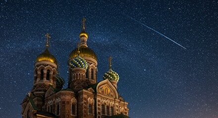 Obraz premium Church Under Starry Night - Majestic church with golden domes under a breathtaking night sky filled with stars and a shooting star
