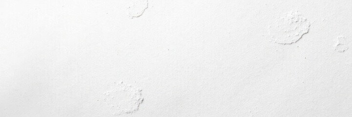 Naklejka premium Soft textured white wall with subtle brush strokes and minor flaws , design, texture