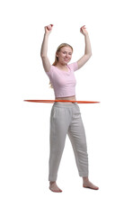 Beautiful young woman exercising with hula hoop on white background