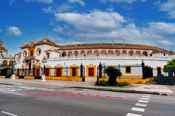 Selbstklebende Fototapeten Stierkampf Plaza de Toros de la Real Maestranza de Caballeria de Sevilla. Historic bullring in Seville, Spain, known for its bullfighting festivals.  © petrrgoskov