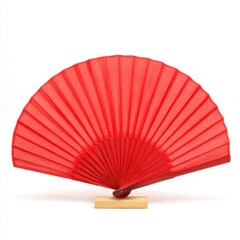 Elegant red fan displayed upright on white background