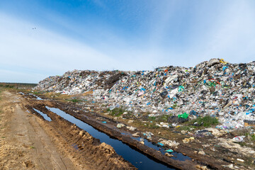 A large expanse of interconnected trash heaps illustrates the waste management issues prevalent in...