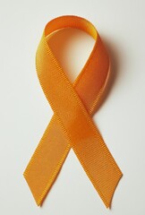 An orange awareness ribbon for cancer is depicted on a transparent background as part of a stock image collection
