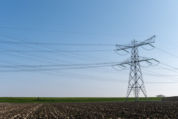 High-voltage lines and power towers, power transmission from nuclear energy plant in Zeeland, generation of electricity in Netherlands