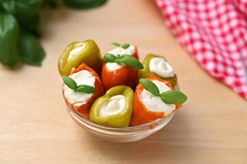 Italian appetizer red and green peppers in a bowl close-up