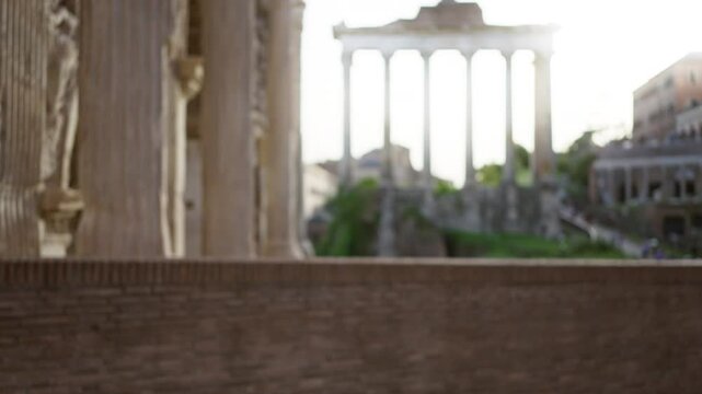 Blurry roman forum ruins create a mystical atmosphere in ancient rome's historical setting with out-of-focus columns and defocused architecture under a bright sky.