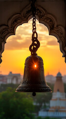 Fototapeta premium Sunset Bell: Ornate Bronze Bell Silhouette at Golden Hour