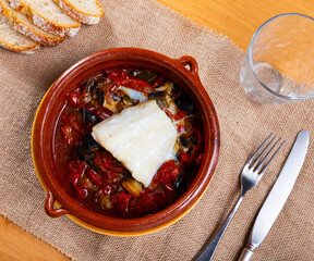 Bacalao is a popular dish Portuguese cuisine made from cod with stewed vegetables