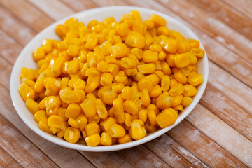 macro photo of corn in glass bowl on table