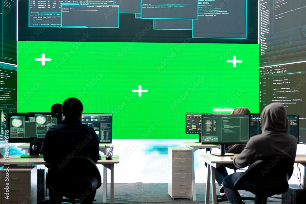 Poster cyber security experts working with mockup layout on a big screen, using encryption and it security 