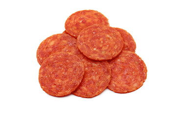 Pepperoni slices (pile) on white background