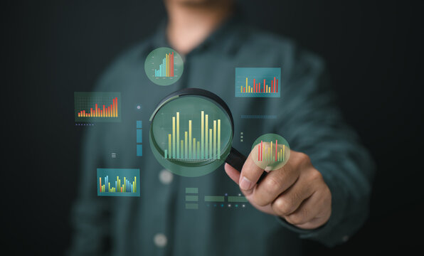 Focusing on key financial insights with magnified data visualization.