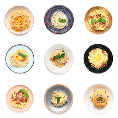 Set of tasty pasta carbonara on white background, top view