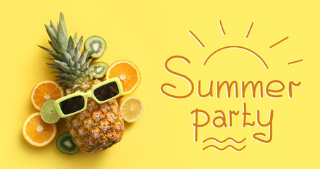 Fresh pineapple with sunglasses, different citrus fruits and kiwi on yellow background