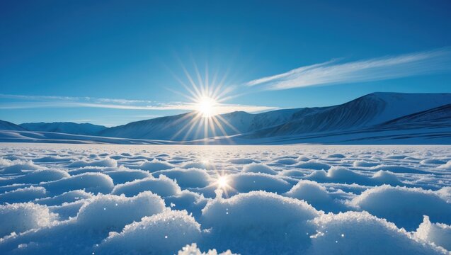 Sun Shining Over Snowy Landscape With Blue Sky And Mountains