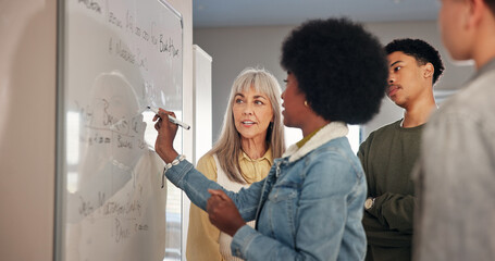 Teacher, lesson and student writing on whiteboard for math solution, education support and equation...