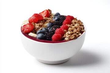 Delicious acai bowl with berries and granola on a white background in a close up shot for healthy eating