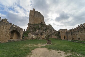 Keep of the castle of the medieval village of Frias surrounded by an immense stone wall