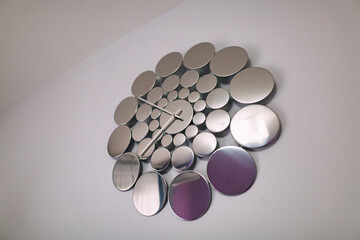 A fashionable and contemporary wall clock featuring a geometric design