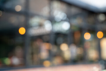 Blur cafe coffee with bokeh backgroundA beautiful, modern cafe with wooden tables, bright lights, and a vintage design creates a cozy, relaxing lifestyle space.