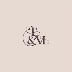 wedding concept monogram elegant and luxury concept TM bold serif initial calligraphy letter