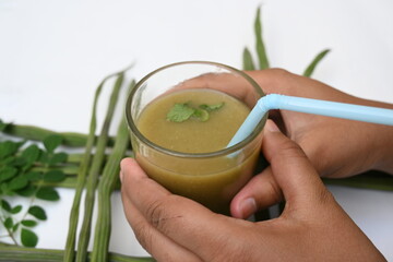 Moringa oleifera or drumstick pods soup. Moringa oleifera other names moringa, horseradish, and ben oil tree and benzolive. Healthy and tasty soup. Healthy drinks. 