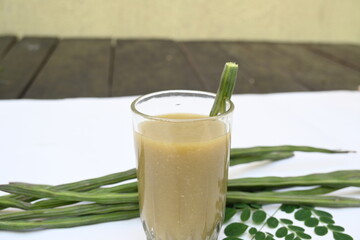 Moringa oleifera or drumstick pods soup. Moringa oleifera other names moringa, horseradish, and ben oil tree and benzolive. Healthy and tasty soup. Healthy drinks. 