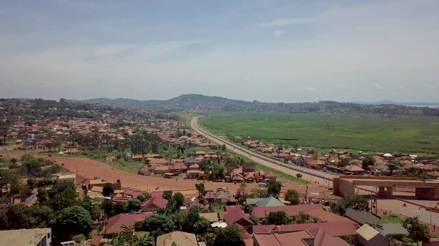 Flying Towards Four-lane Road Kampala Southern Bypass In Kampala, Uganda, East Africa. Aerial Drone Shot