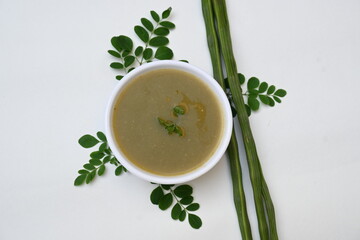 Moringa oleifera or drumstick pods soup. Moringa oleifera other names moringa, horseradish, and ben oil tree and benzolive. Healthy and tasty soup. Healthy drinks. 