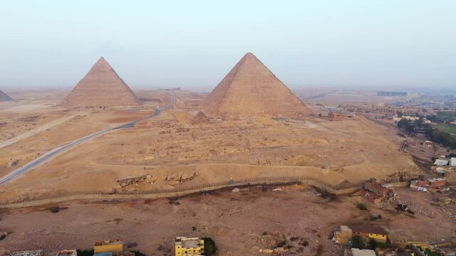 Giza Pyramids On Giza Plateau In Greater Cairo, Egypt - Aerial Drone Shot