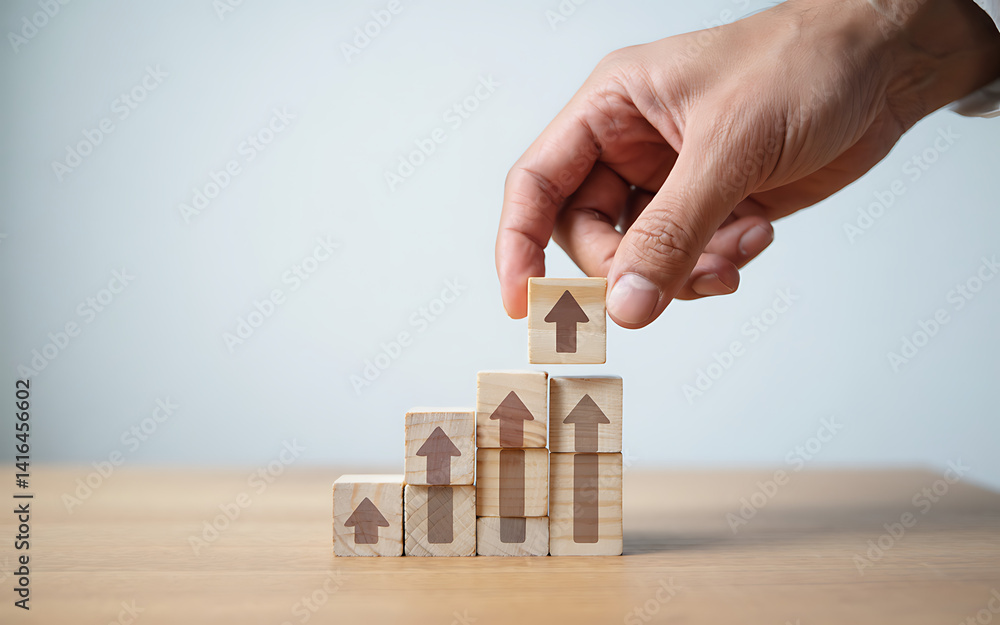 Poster building growth hand placing block with up arrow on stacked wooden cubes, representing success and d