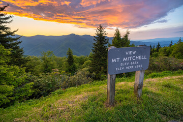 Car road trip on Blue Ridge Parkway in North Carolina Appalachian mountains. Mt Mitchell Overlook in summer season at sunset. Summertime landscape of beautiful nature