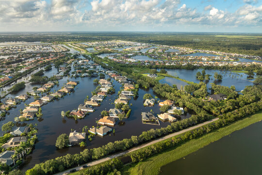 Hurricane Debby tropical rainstorm flooded residential homes in suburban community in Sarasota, Florida. Aftermath of natural disaster