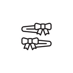 Two hair clips, each decorated with a simple bow design.