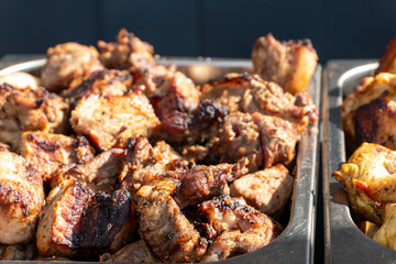 Grilled Pork Pieces on a Metal Tray
