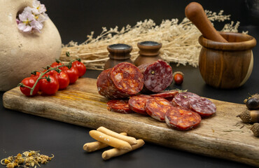 Savor a beautifully crafted Charcuterie Board with assorted Sausages and Fresh Ingredients