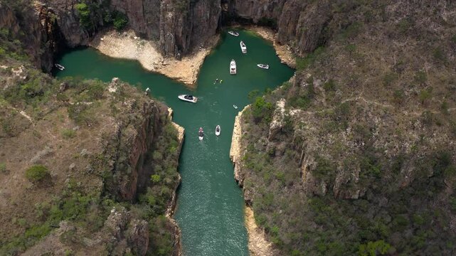 A serene waterway surrounded by rocky cliffs in paraiso achado, brazil, aerial view