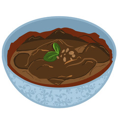 a bowl of rendang