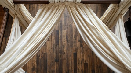 Subtle beige drapes framing a wooden stage under natural daylight from above