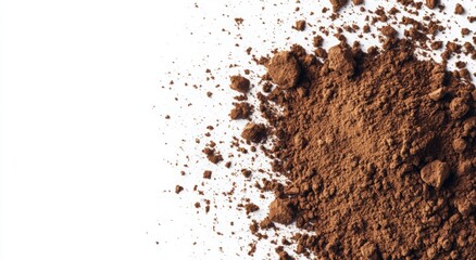 A pile of ground coffee powder, dried and isolated on a white background