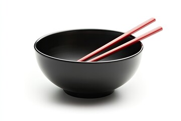 Empty black bowl with red chopsticks. Simple, elegant setting