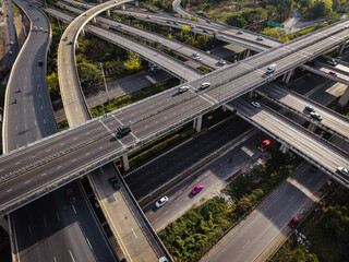 Aerial view intersection transport cross road building with traffic vehicle