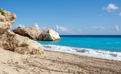 Empty beautiful tropical beach with turquoise sea and rock formations. There is a video from the same location in my collection