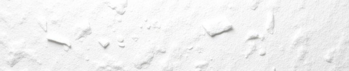 Rough textured white paper surface with scattered wood pulp fibers, wood pulp, rustic