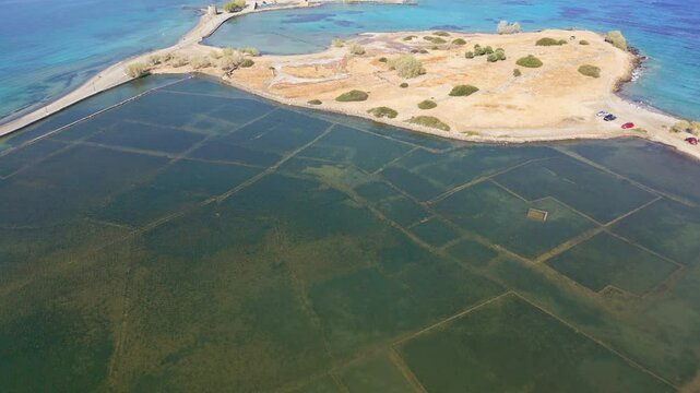 Aerial shot of submerged ruins of Dorian city Olous near Elounda, Crete